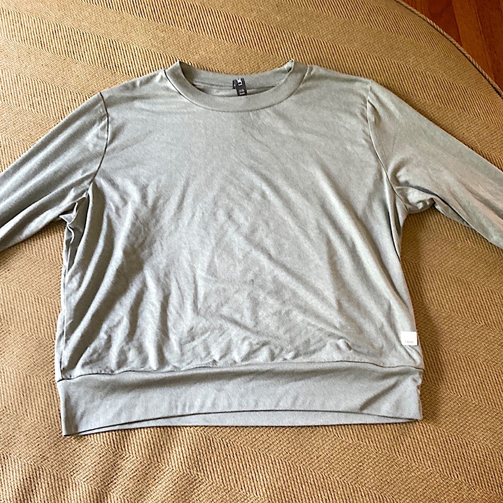 A sage green sweatshirt